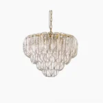 Poliedri tiered glass chandelier overhead studio view with rippled clear glass petals and brass hardware detail