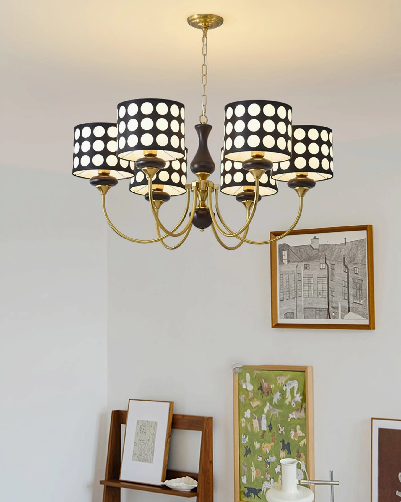 Polka dot chandelier suspended from ceiling rose, mid-century modern carved plaster detail