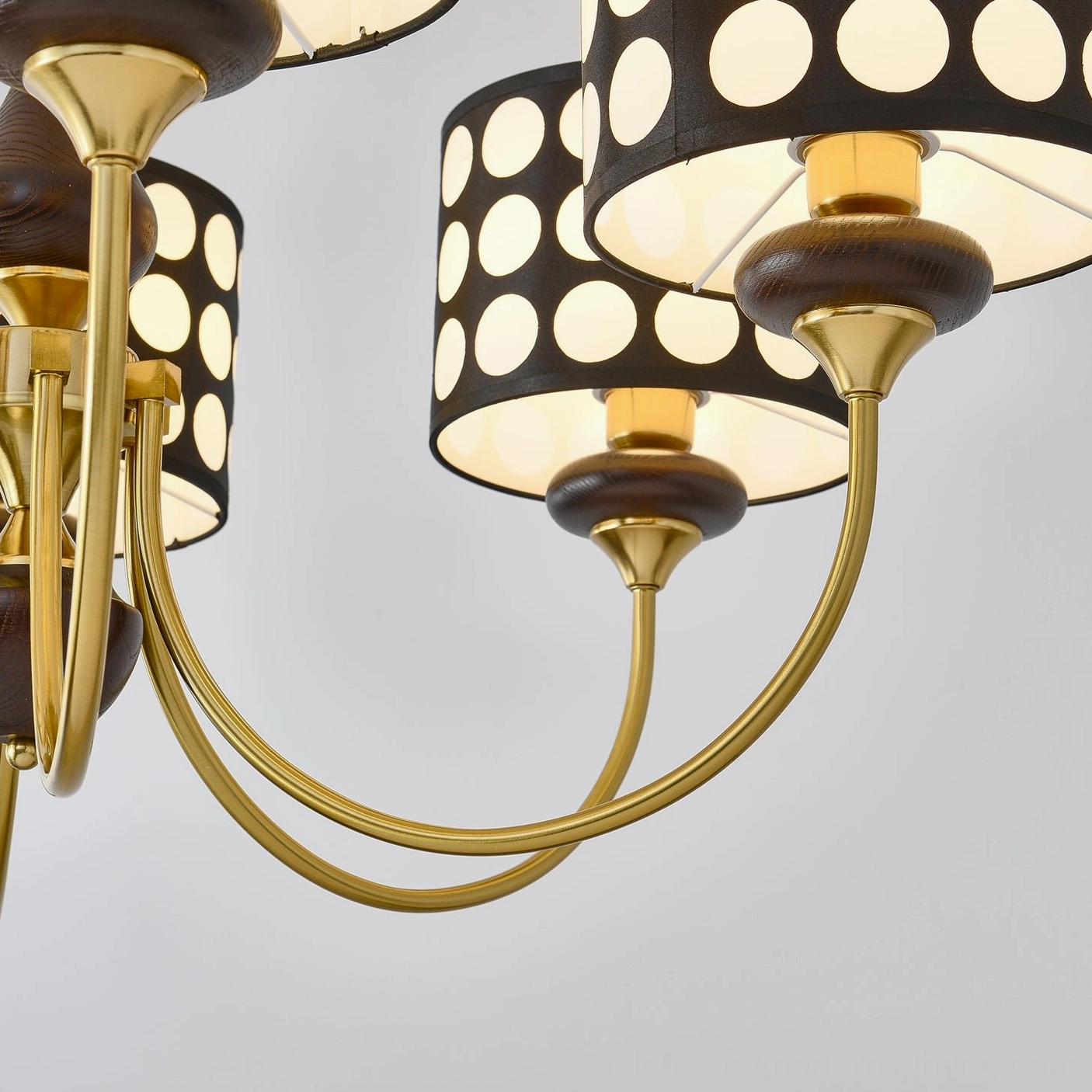 6-head polka dot chandelier showcasing walnut wood accents and metal frame joinery details