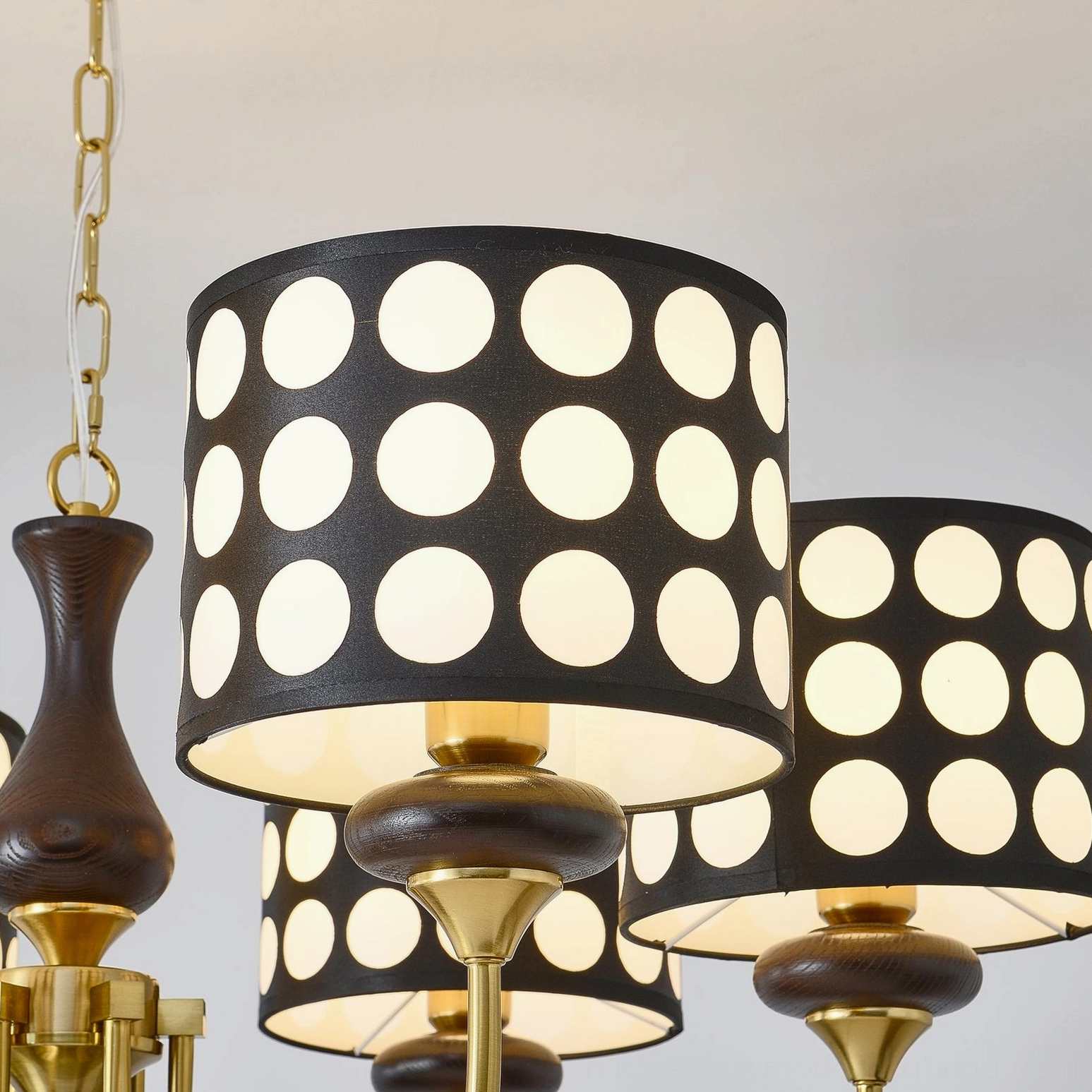 Black polka dot chandelier warm atmosphere lighting in contemporary residential interior space