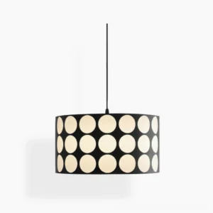 Black and white polka dot pendant lamp with fabric shade in studio frontal view showing geometric dot pattern