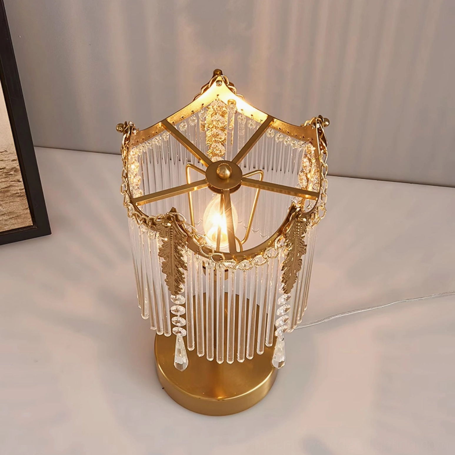 Popity crystal table lamp glowing with incandescent bulb, showcasing royal vintage styling and warm ambiance