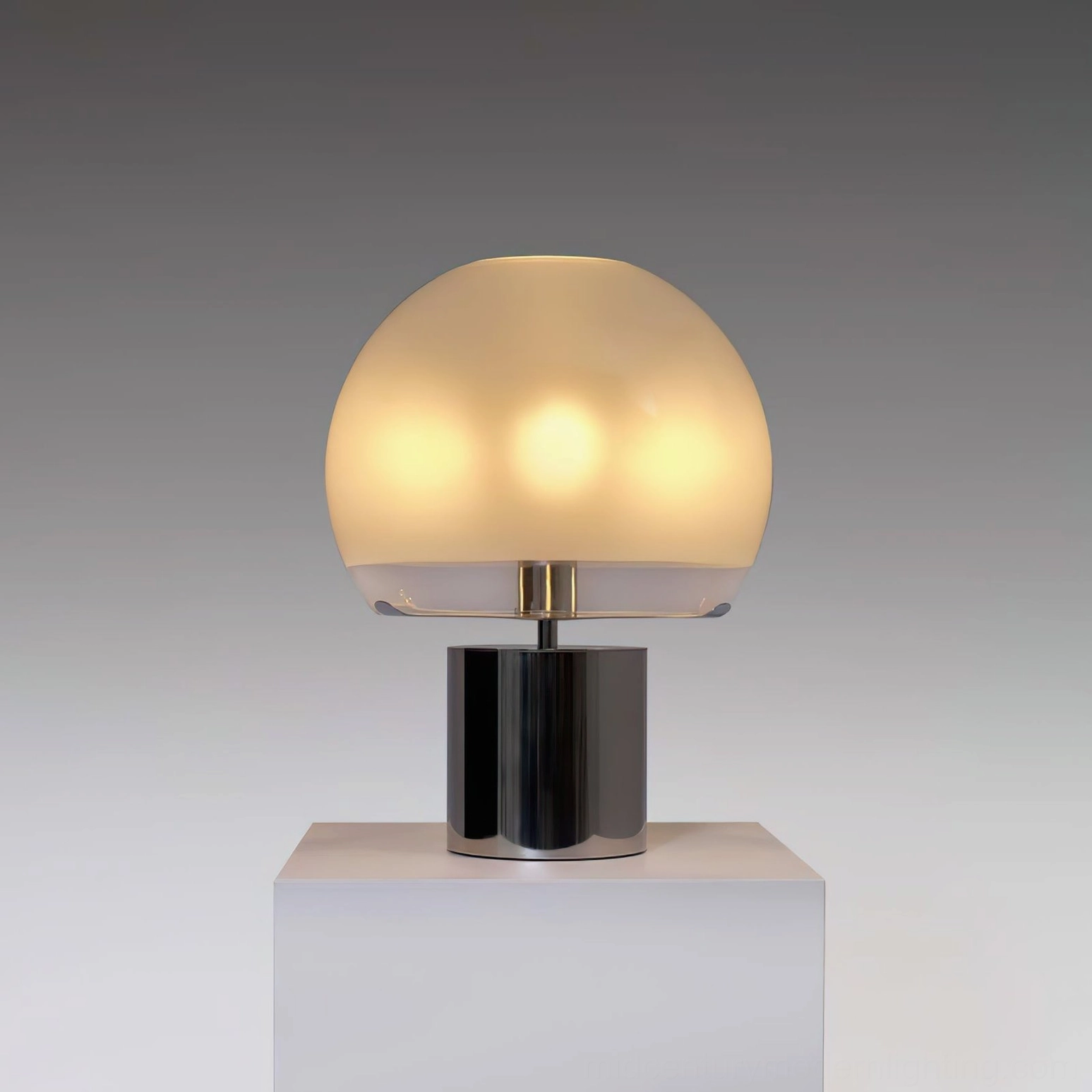 Porcino Space Age table lamp with geometric orb design and cylindrical metal base overhead view