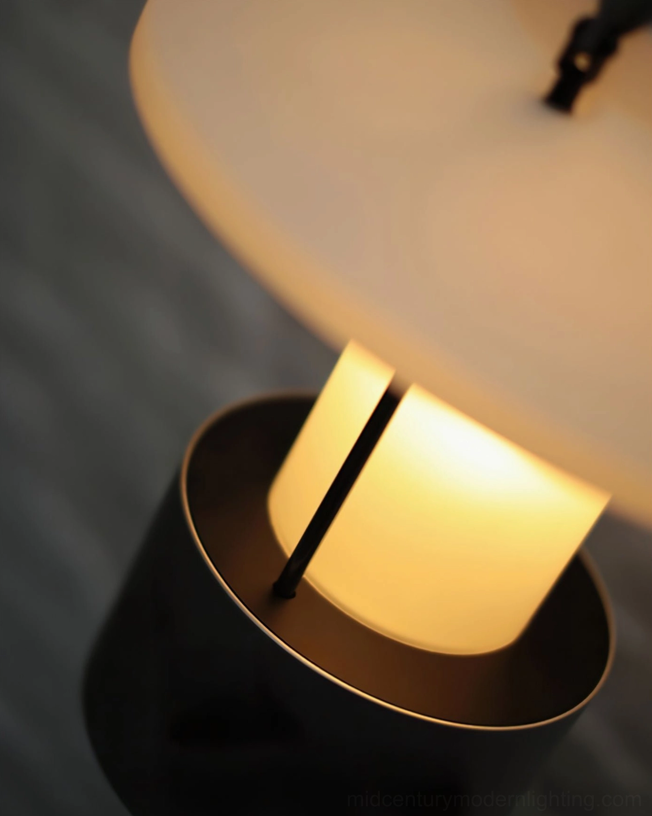Portable outdoor lantern with built-in battery and frosted shade mid-century modern