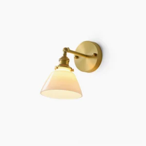 Portland mid-century modern brass wall sconce with frosted conical shade, front studio view showcasing industrial vintage design