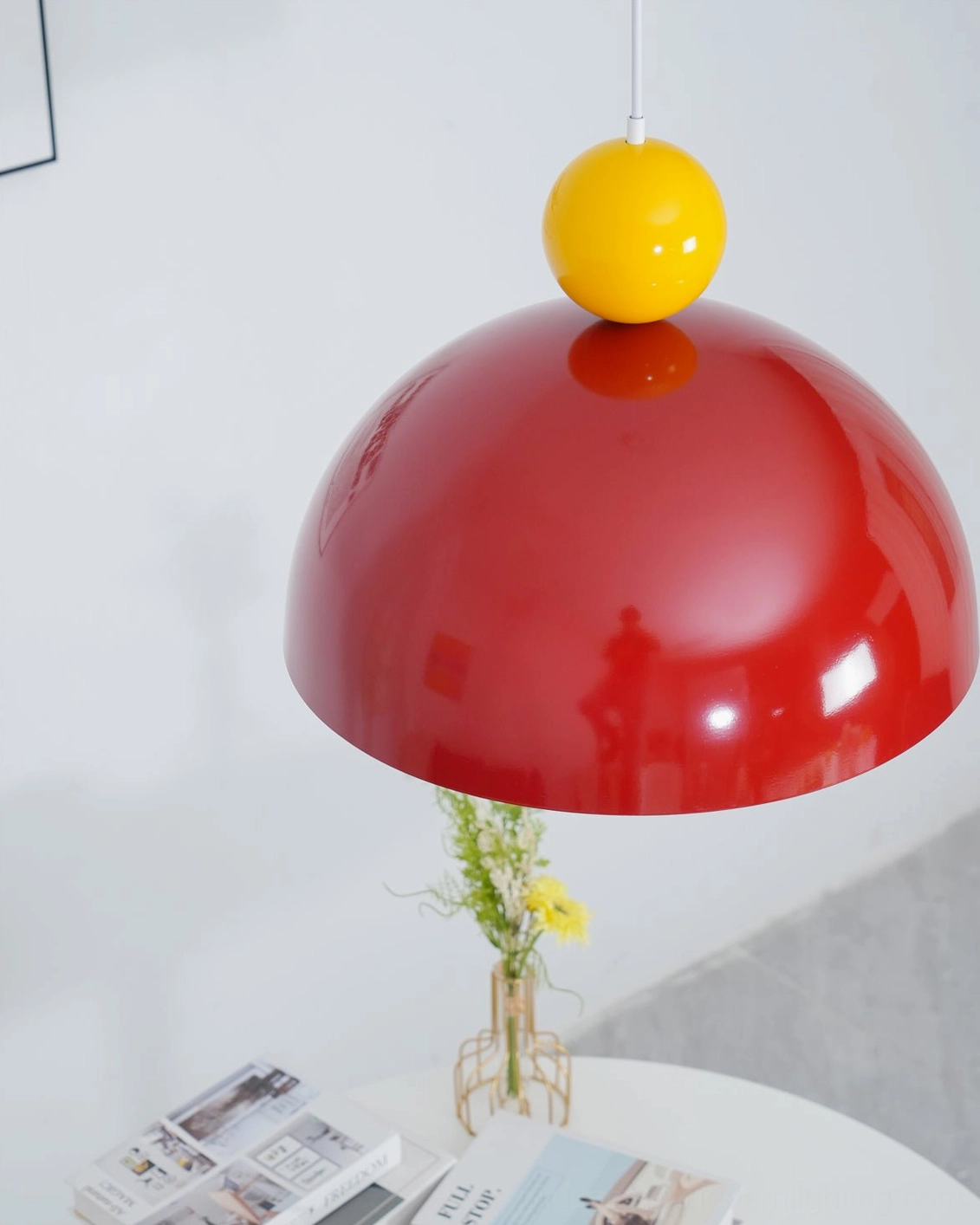 Gold and cream color variant of Posa pendant lamp showcasing classic mid-century color palette