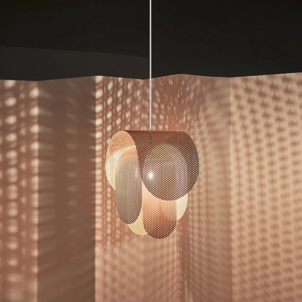 Posie pink pendant light casting geometric shadow patterns on textured wall surface