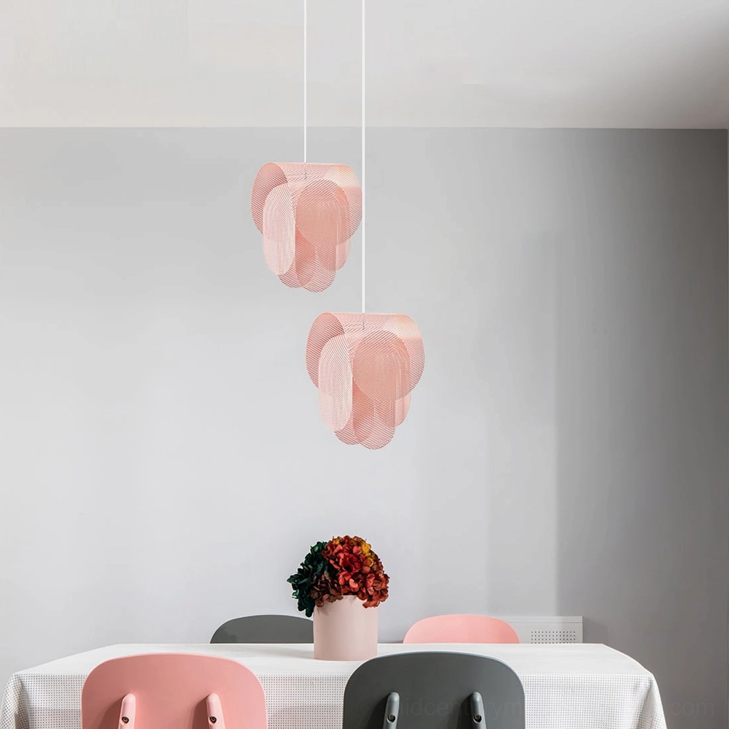 Two matching pink Posie pendant lights in grey-walled modern dining room with contemporary styling