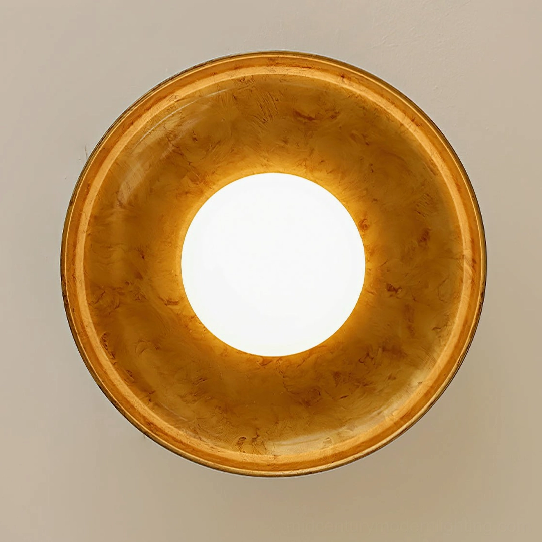 Close-up interior view of pot-lid ceiling light with integrated LED bulb visible through opal glass diffuser