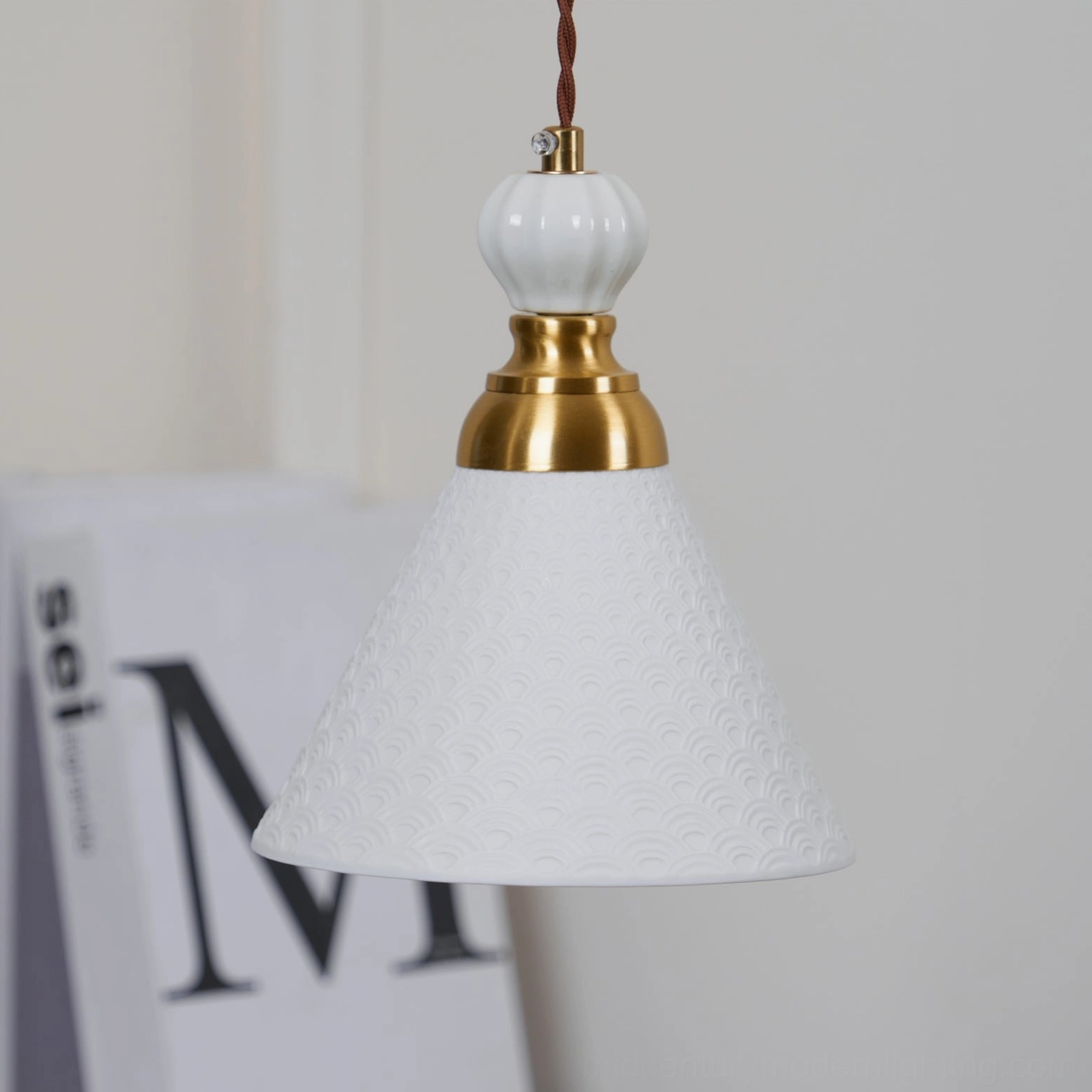Premium artisan ceramic pendant light fixture with twisted fabric cord and brass cap