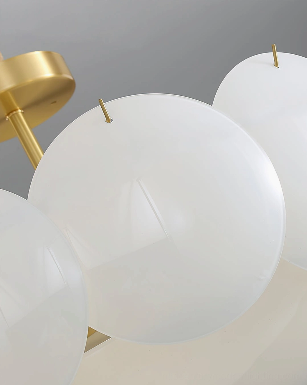 Prisma frosted white glass shade close-up overhead view, ceiling lamp glass component detail