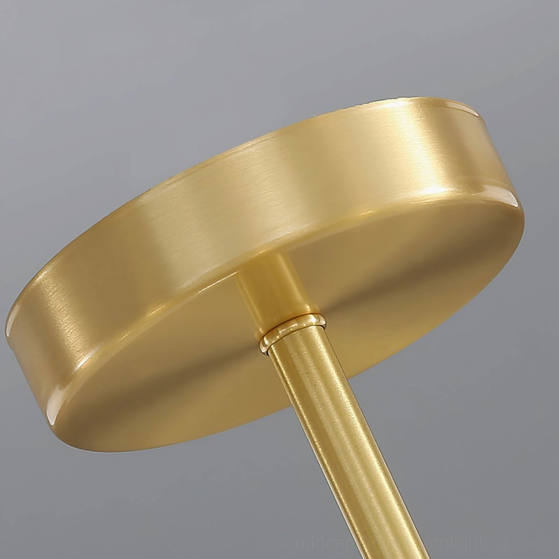 Prisma ceiling lamp brushed brass base close-up detail shot, metal construction and hardware