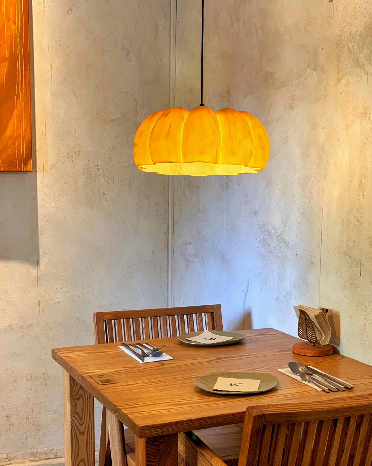 Pumpkin pendant lamp detail showing resin material quality and ribbed surface craftsmanship