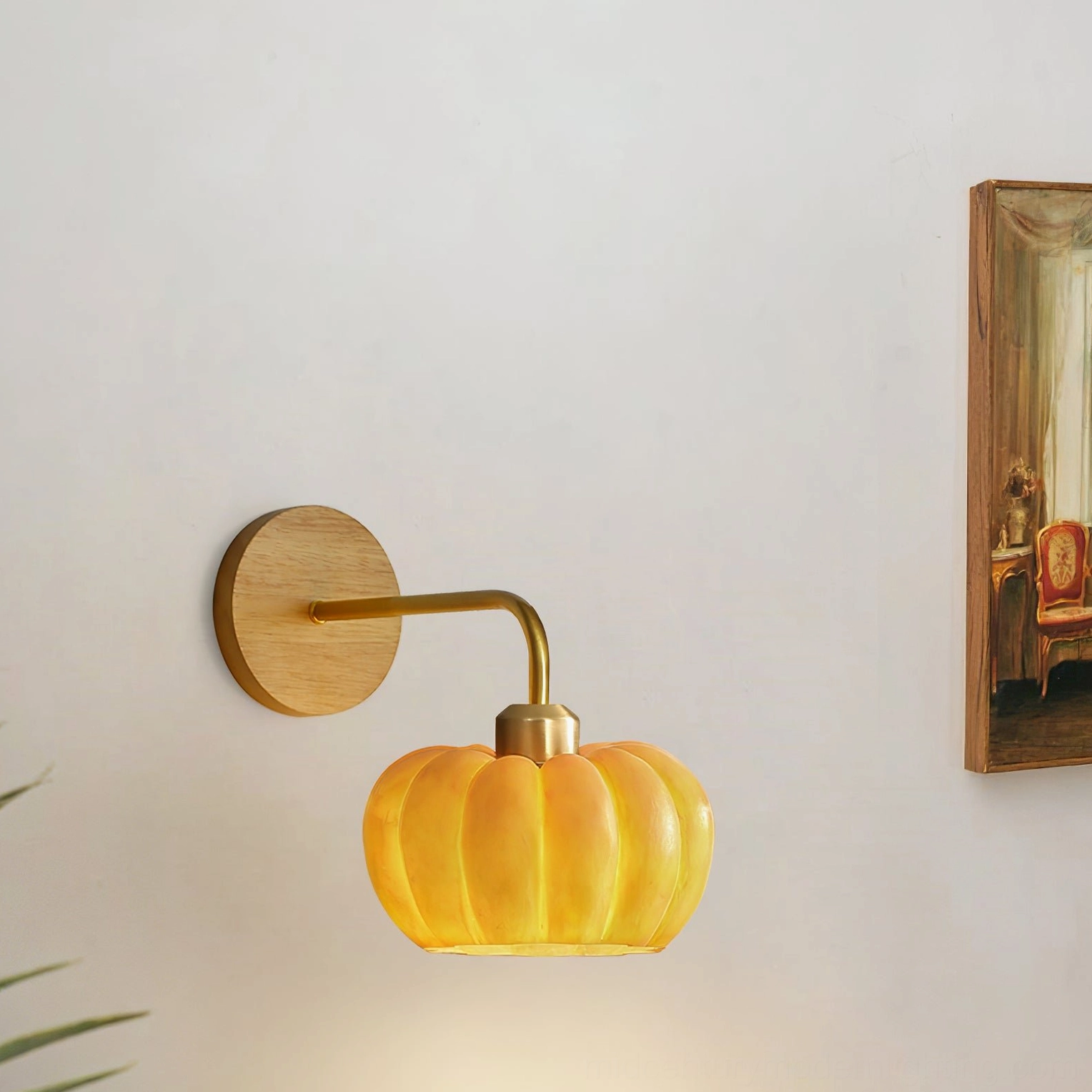 Pumpkin wall sconce in eclectic interior setting, versatile mid-century modern design with earth-tone decor