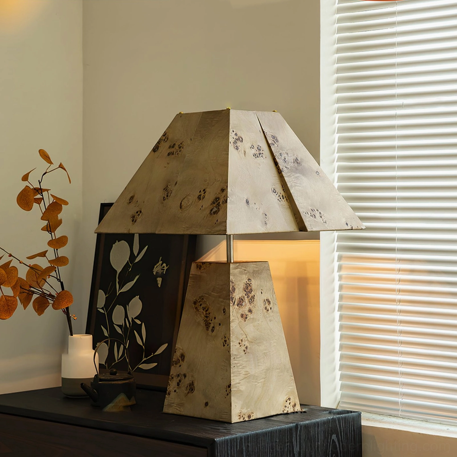 Mid-century modern pyramid wood lamp styled in vintage bedroom corner with dried flower arrangements, warm ambient lighting