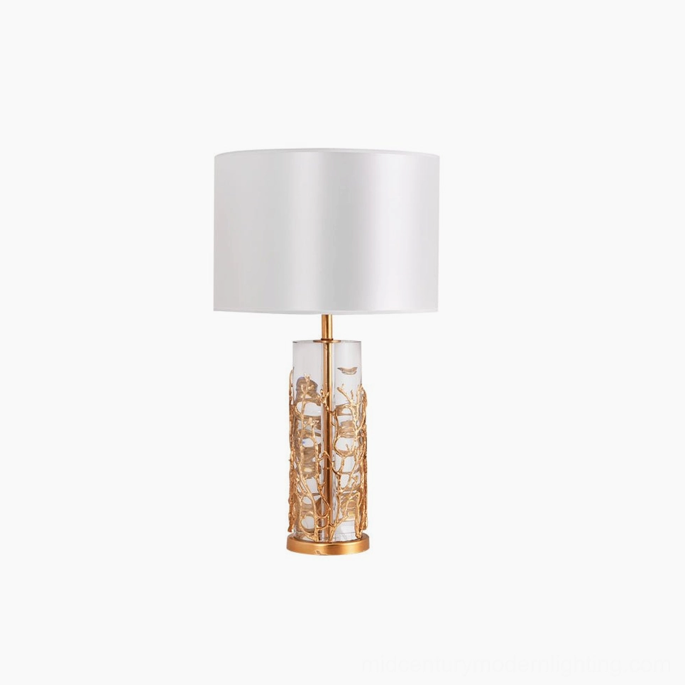 Quatrefoil geometric pattern table lamp brass base white shade contemporary design