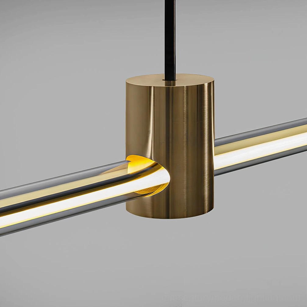 RA Linear Pendant light side close-up, brass joint clear glass tube warm LED glow
