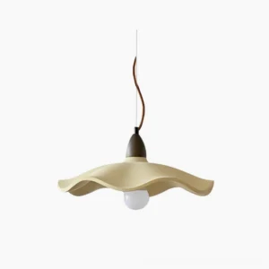 Radha wave pendant light with matte beige cement shade and walnut wood crown, studio overhead view showcasing sculptural organic form