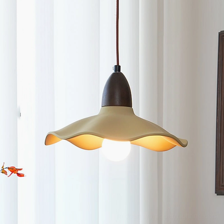 Radha wave pendant lamp front view in bright minimalist room with soft natural lighting and sheer curtains