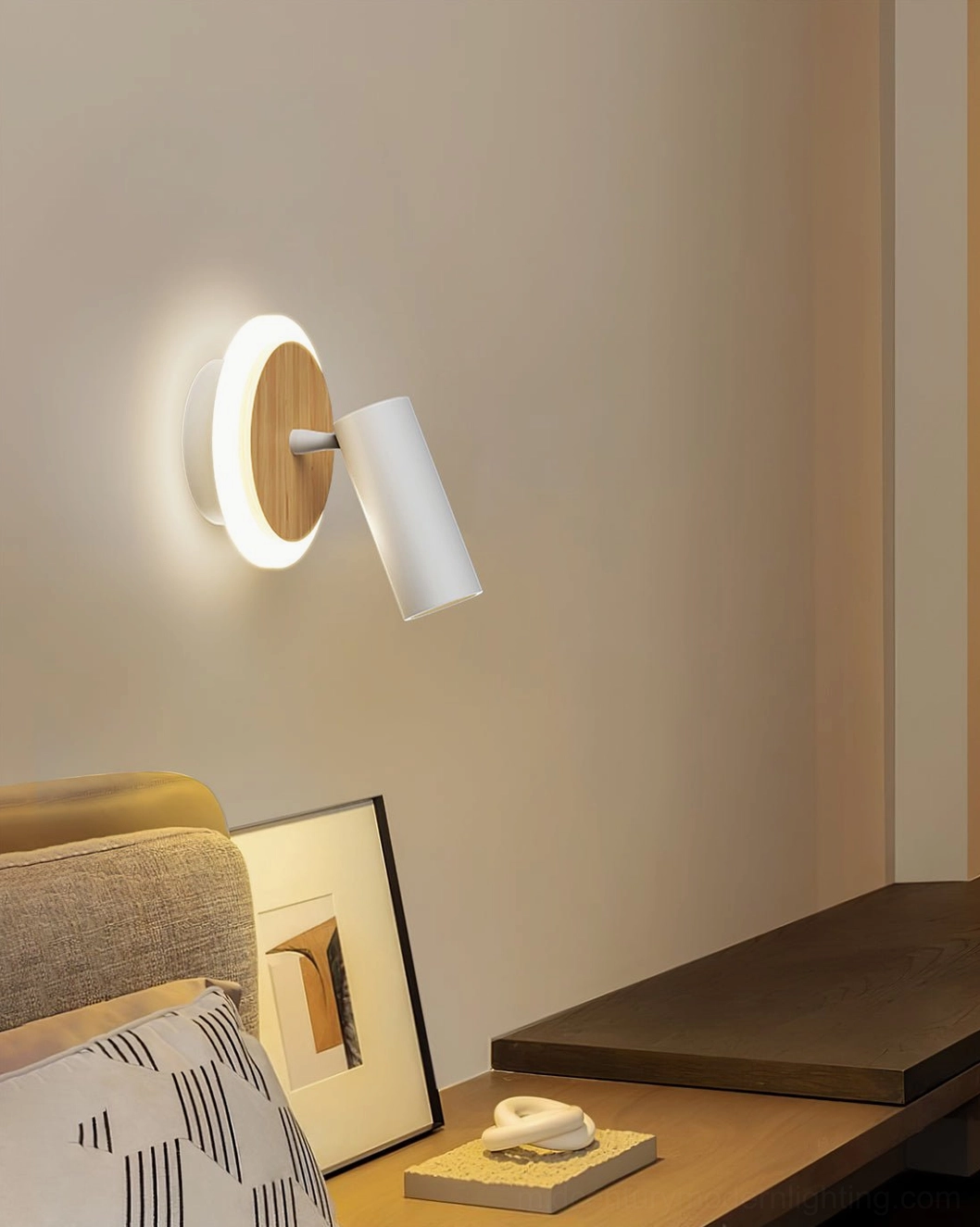 Ramen Adjustable Wall Spotlight - White matte finish with natural wood back plate mounted in bedroom scene
