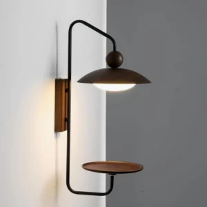Rancho wall-mounted lamp with integrated LED and wooden shelf, three-quarter side angle showing curved dome shade