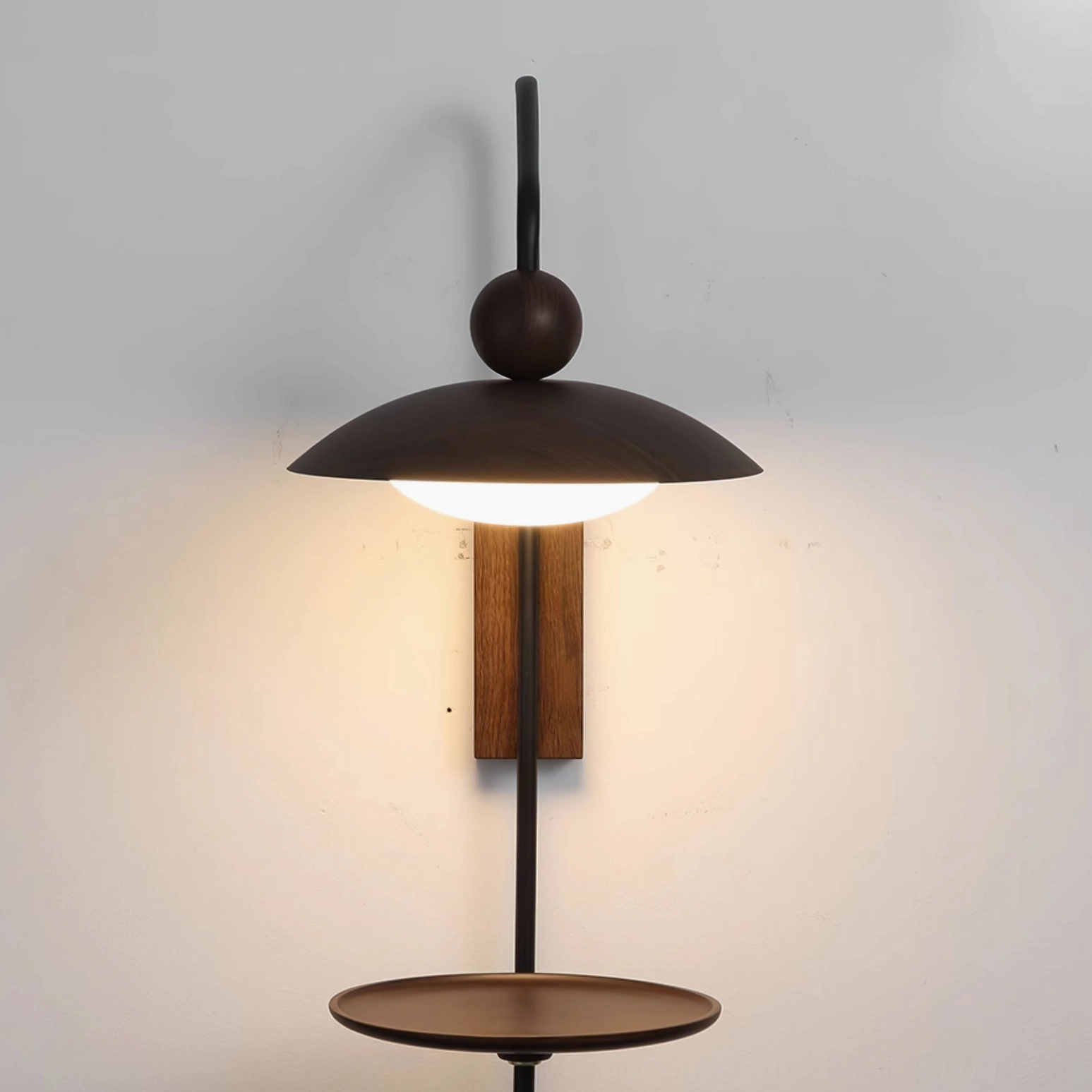 Rancho minimalist wall sconce showing integrated LED technology and dome-shaped lampshade design