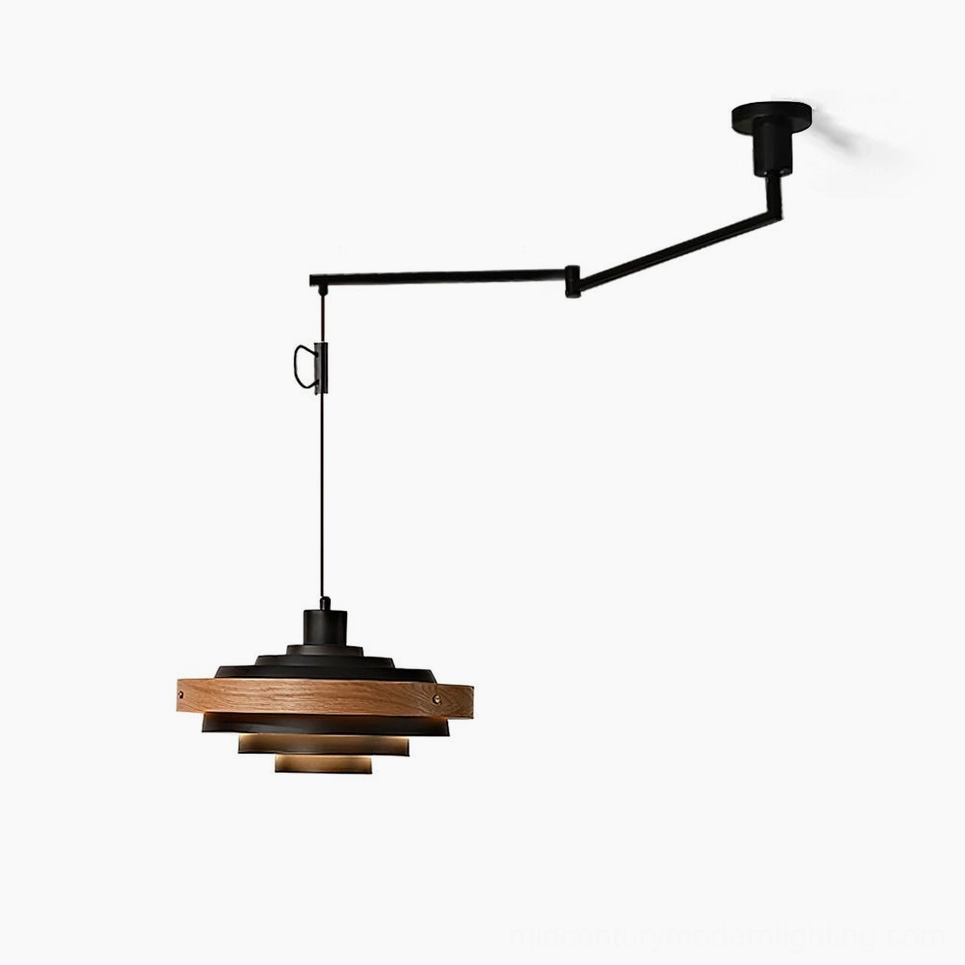 Rancho adjustable swing arm pendant light with layered wood and black metal shade, studio side-front view