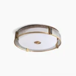 Randolph mid-century modern brass ceiling light with frosted acrylic diffuser, studio product view