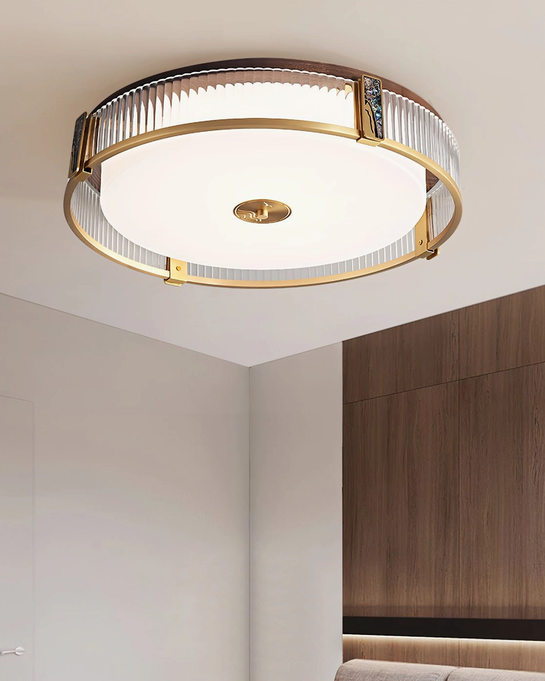 Randolph brass ceiling lamp creating warm ambient lighting in contemporary bedroom