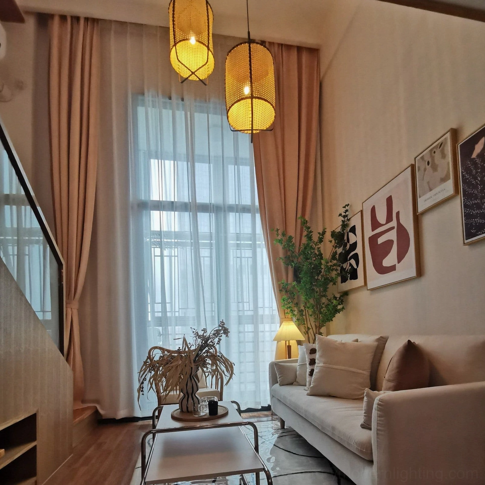 Rattan cane pendant lamp hanging from ceiling, showcasing hand-stitched frame edges, natural material warmth, and functional illumination design