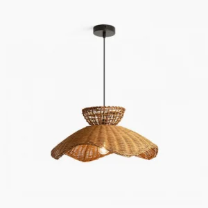 Handwoven rattan pendant light with scalloped edge, overhead studio view showing natural brown woven texture and wavy silhouette