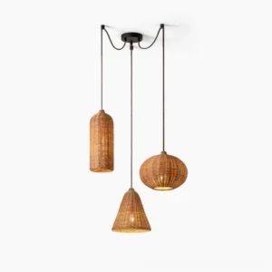 Three-shade hand-woven rattan pendant light set with black metal hardware, studio view showing cylindrical, conical, and spherical woven designs