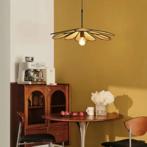 Mid-century rattan pendant lamp hanging above retro mustard yellow dining area with vintage cabinet and warm ambient lighting