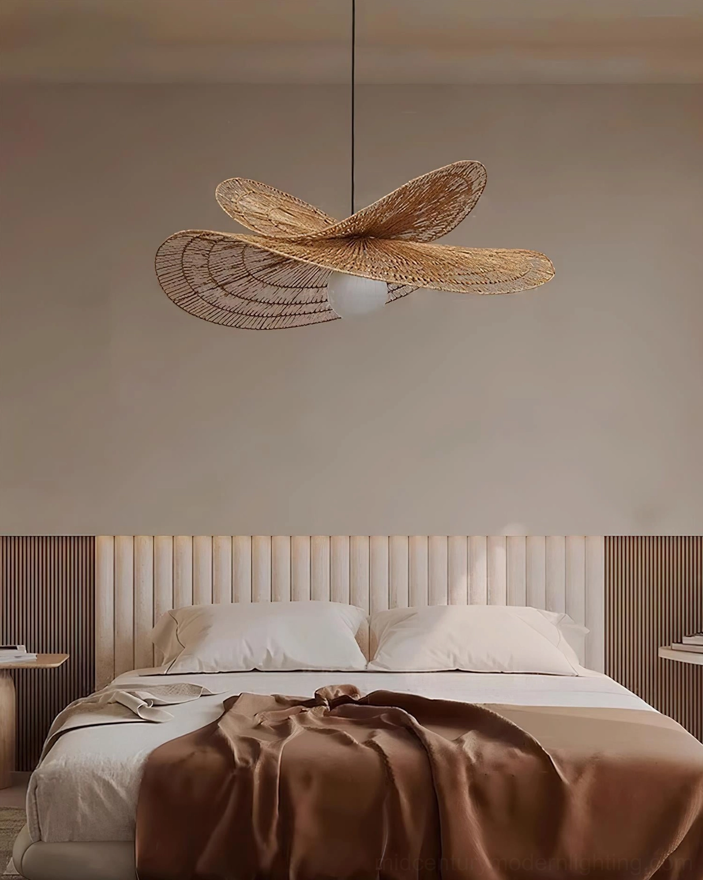 Minimalist bohemian bedroom featuring rattan petal pendant lamp with wabi-sabi aesthetic and soft lighting