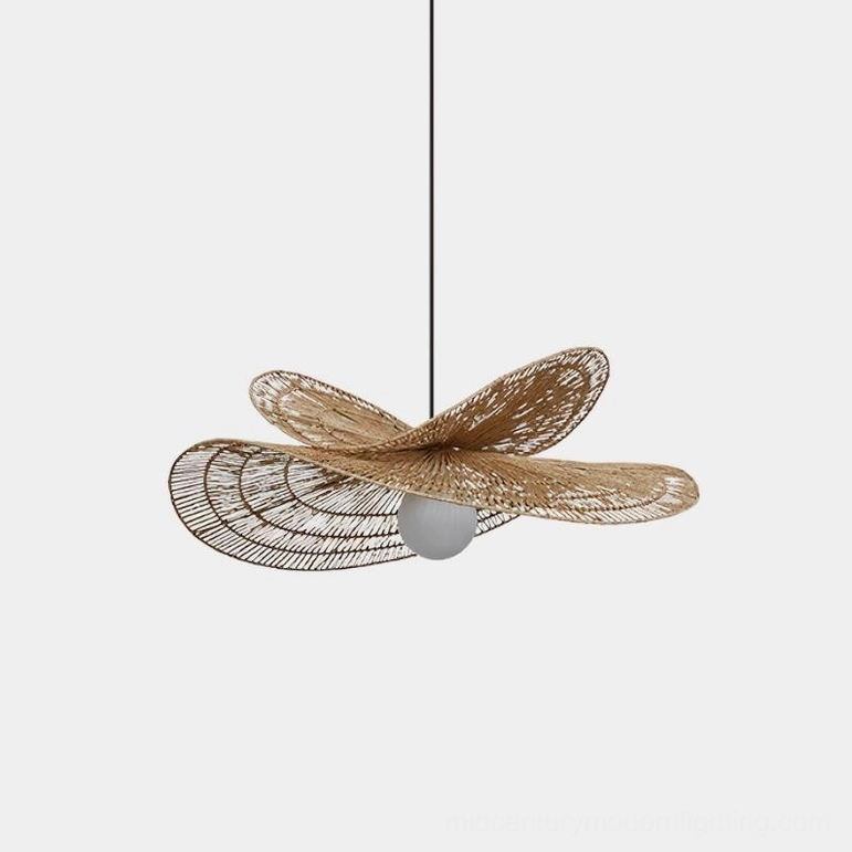 Full view of handwoven natural rattan petal pendant lamp with black metal frame and frosted glass bulb