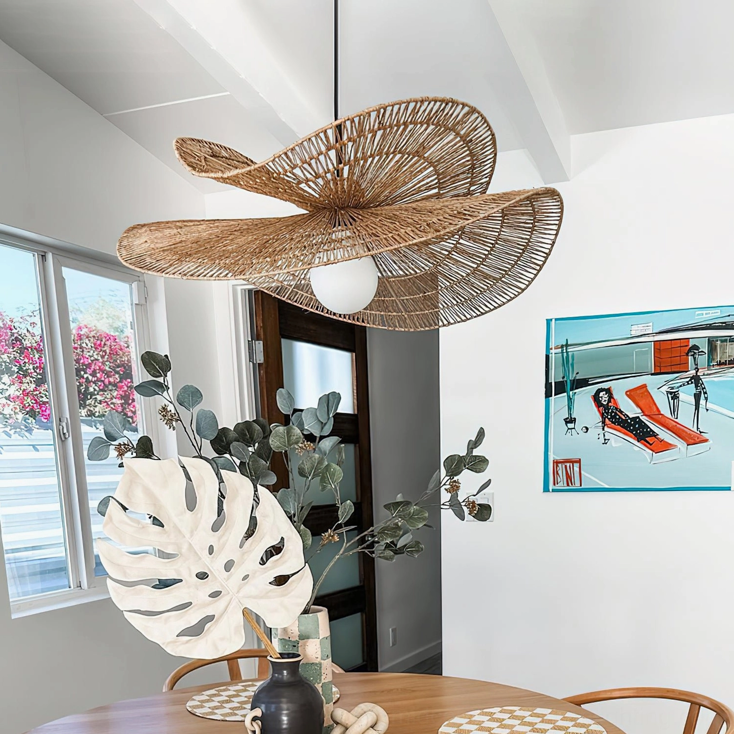 Rattan petal pendant light fixture showcasing handcrafted weave pattern and natural material quality