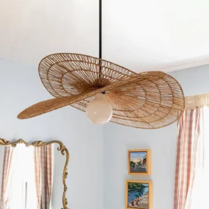 Rattan petal pendant lighting fixture installed in retro home interior with frosted glass bulb creating warm ambient glow