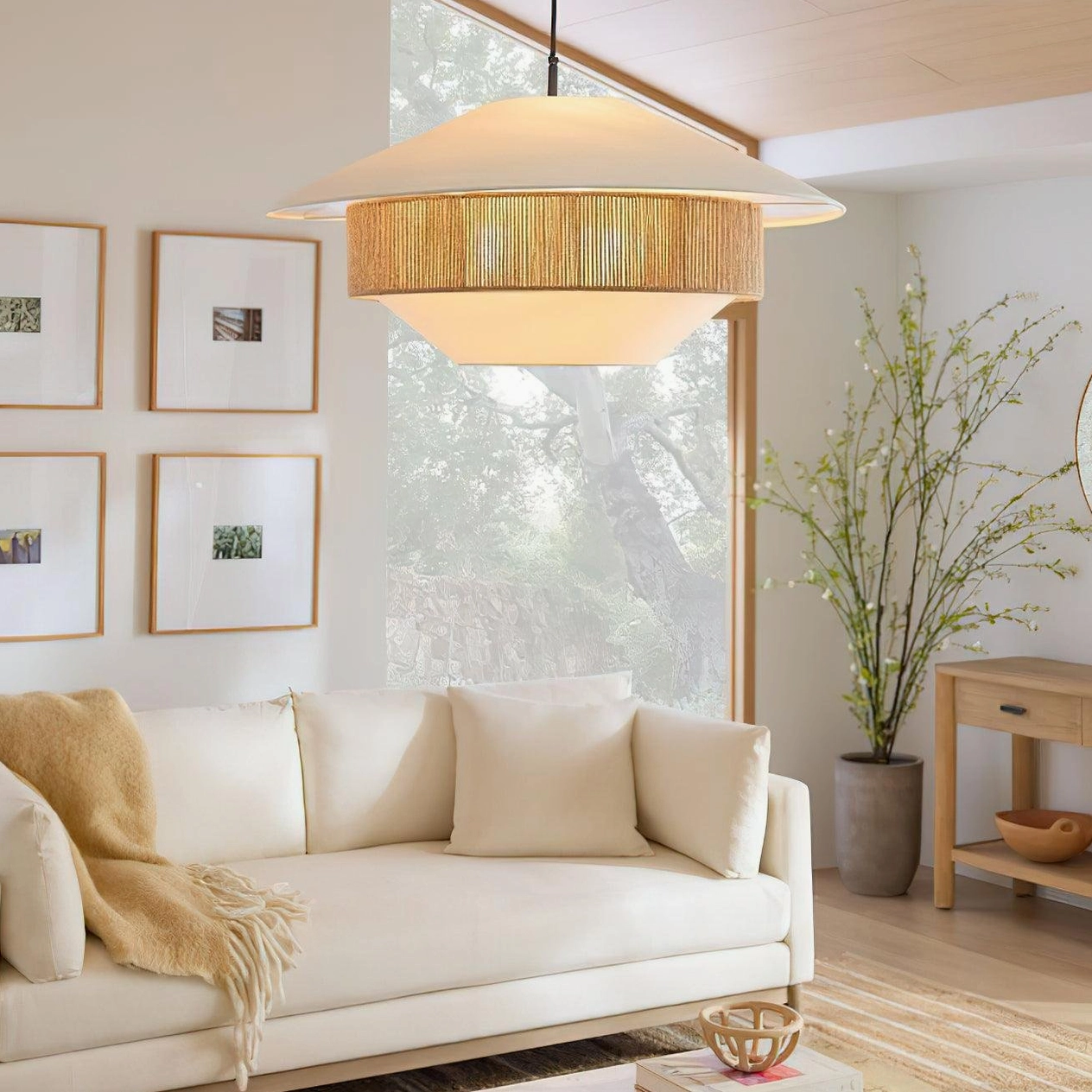 Mixed woven pendant light in modern neutral living room with sofa and abstract wall art