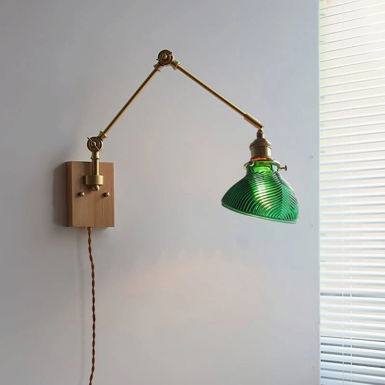 Rebell swing arm wall lamp with wood base and green ribbed glass shade, front studio view on white background