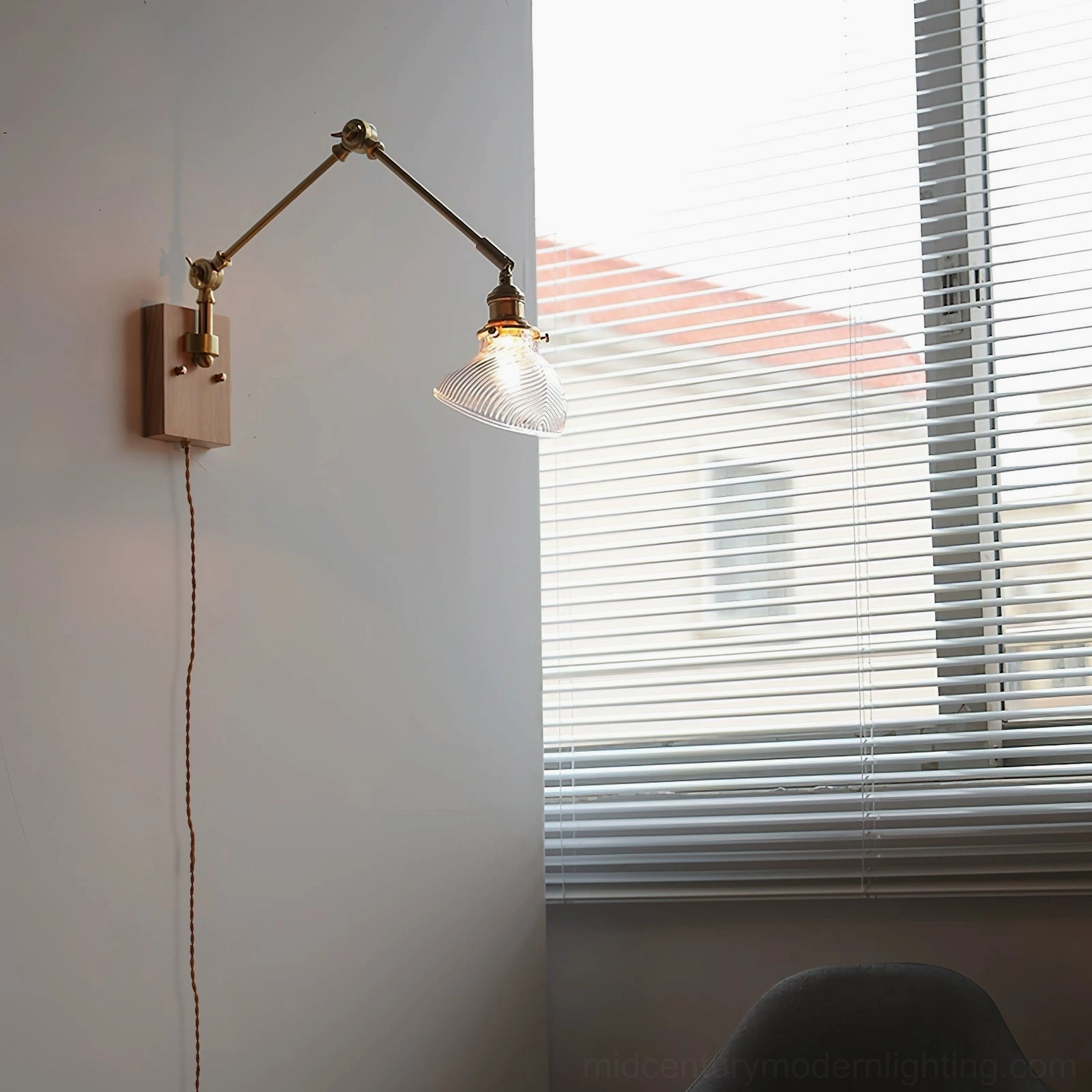 Rebell swing arm wall lamp mid-century modern articulating arm with brass fittings, overall product view
