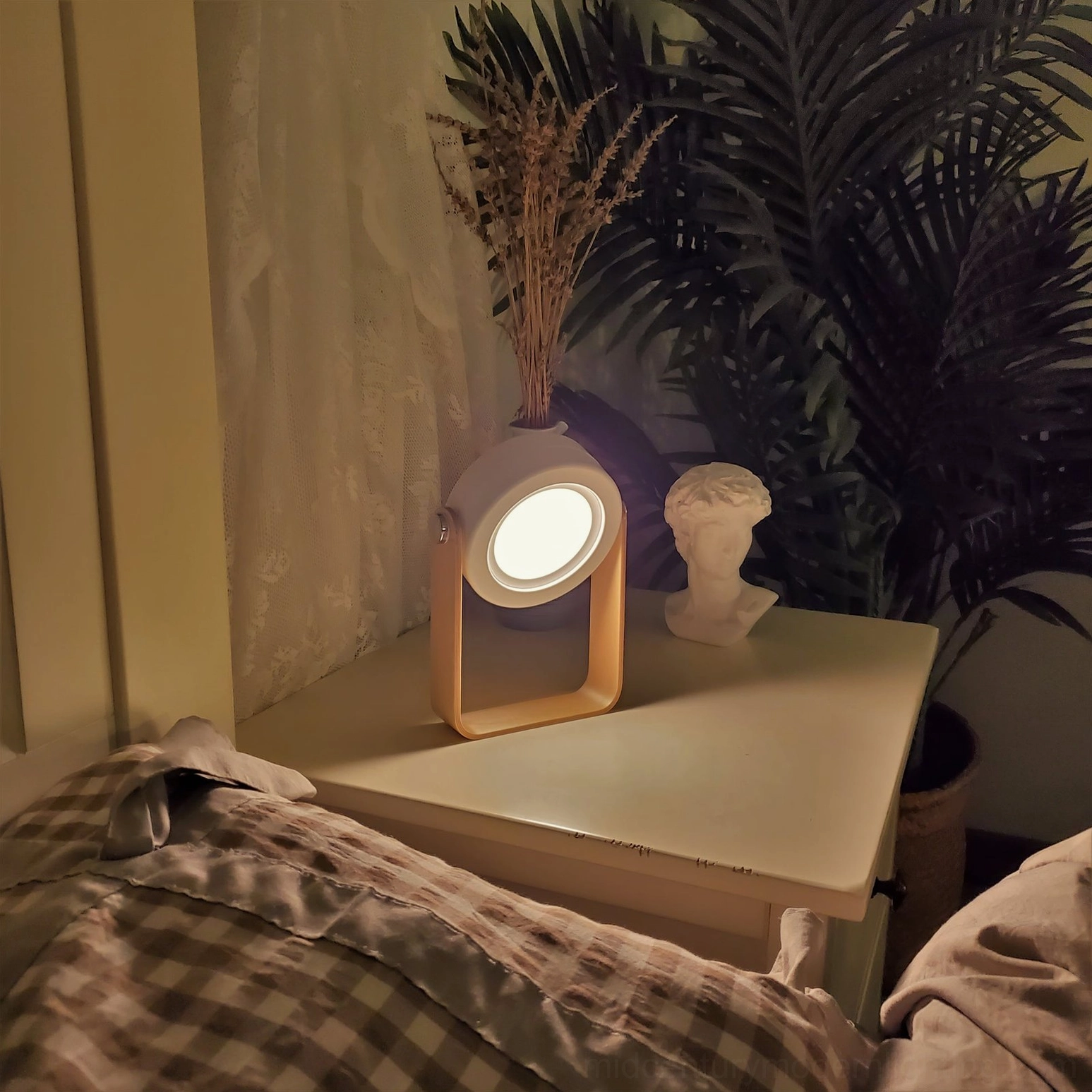 Red and wood lantern table lamp creating bold design statement, architectural honeycomb light filter