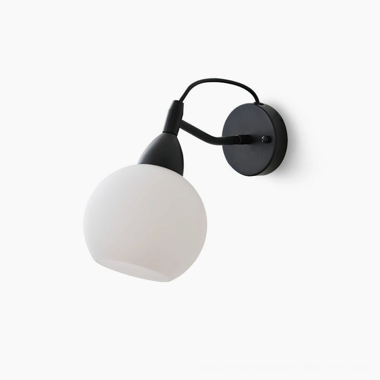 Reese wall lamp available in black and white finish options showing color variants side by side