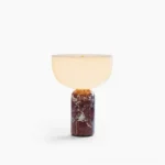 Renard marble table lamp with reddish brown Rosso Levanto base and frosted glass shade on white studio background
