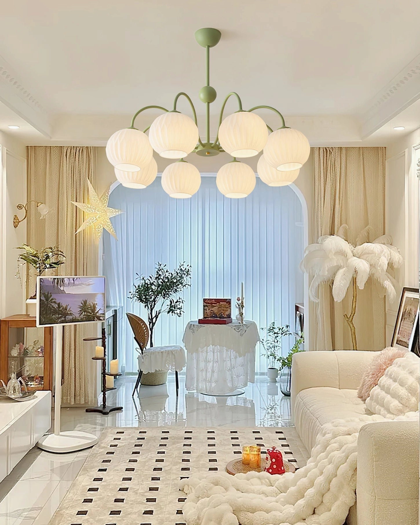 Renee 8-head chandelier in transitional room design with mixed furnishing styles and warm lighting