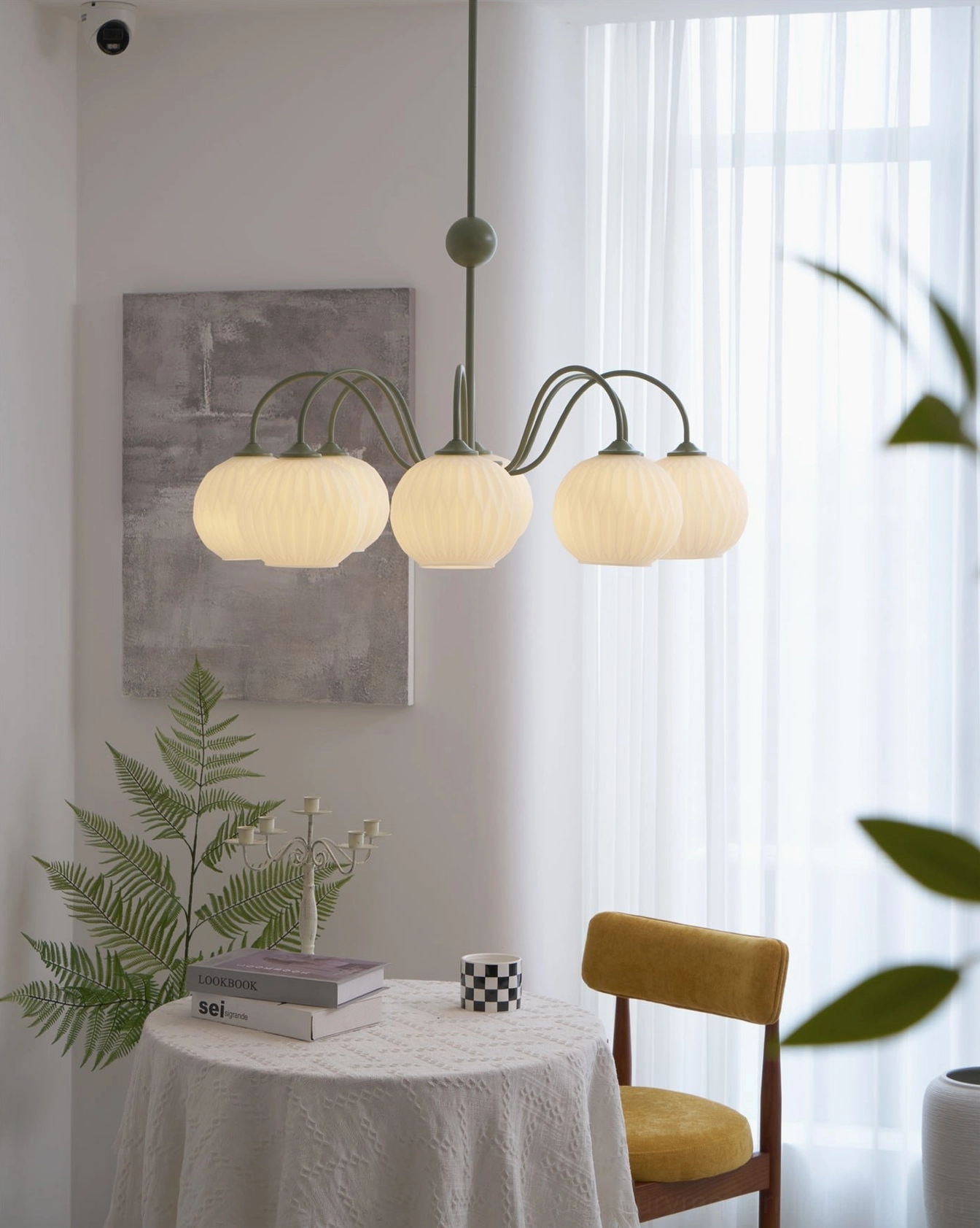 Renee 8-head white metal frame globe chandelier full view studio photograph