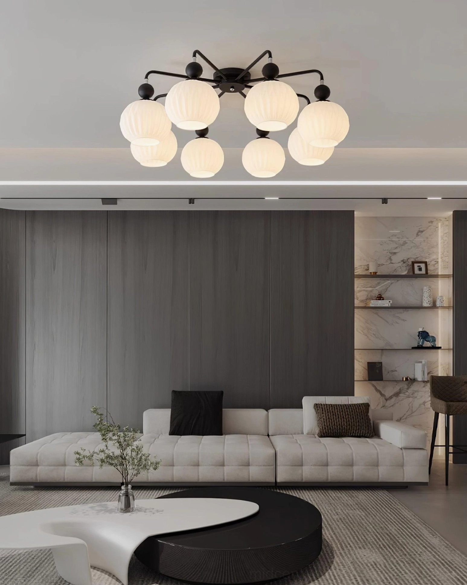 8-head matte black ceiling chandelier with spherical white glass shades in high-end modern interior