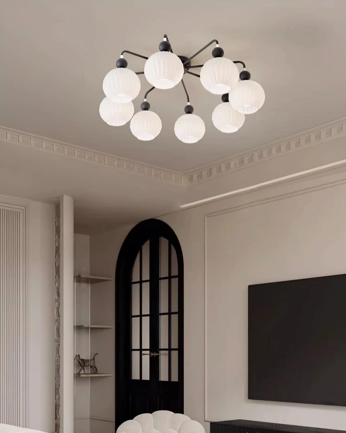 Mid-century modern ceiling light detail showing ribbed glass shade texture and metal frame construction