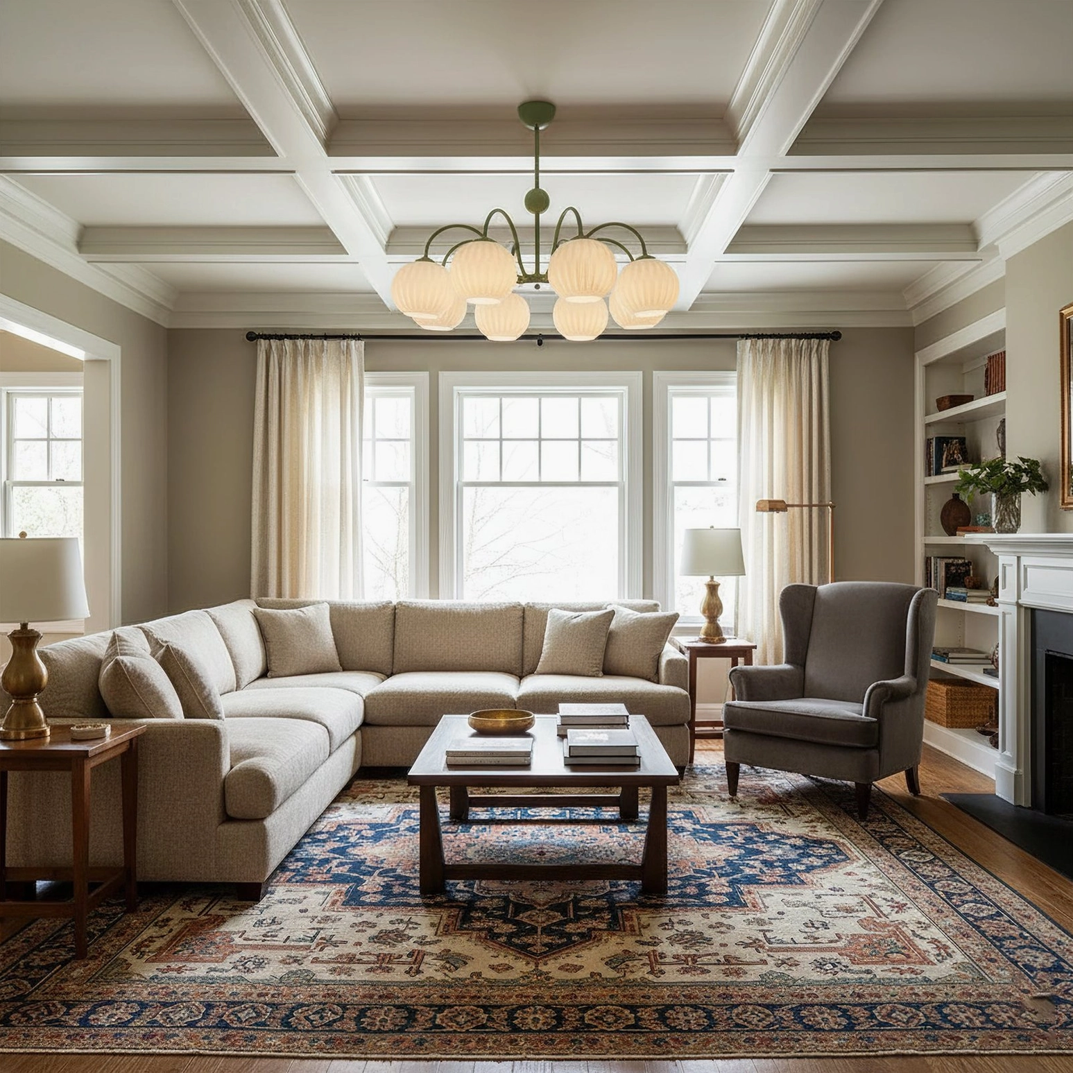 Renee 8-head chandelier in formal traditional living room with coffered ceiling and fireplace, black metal frame statement lighting