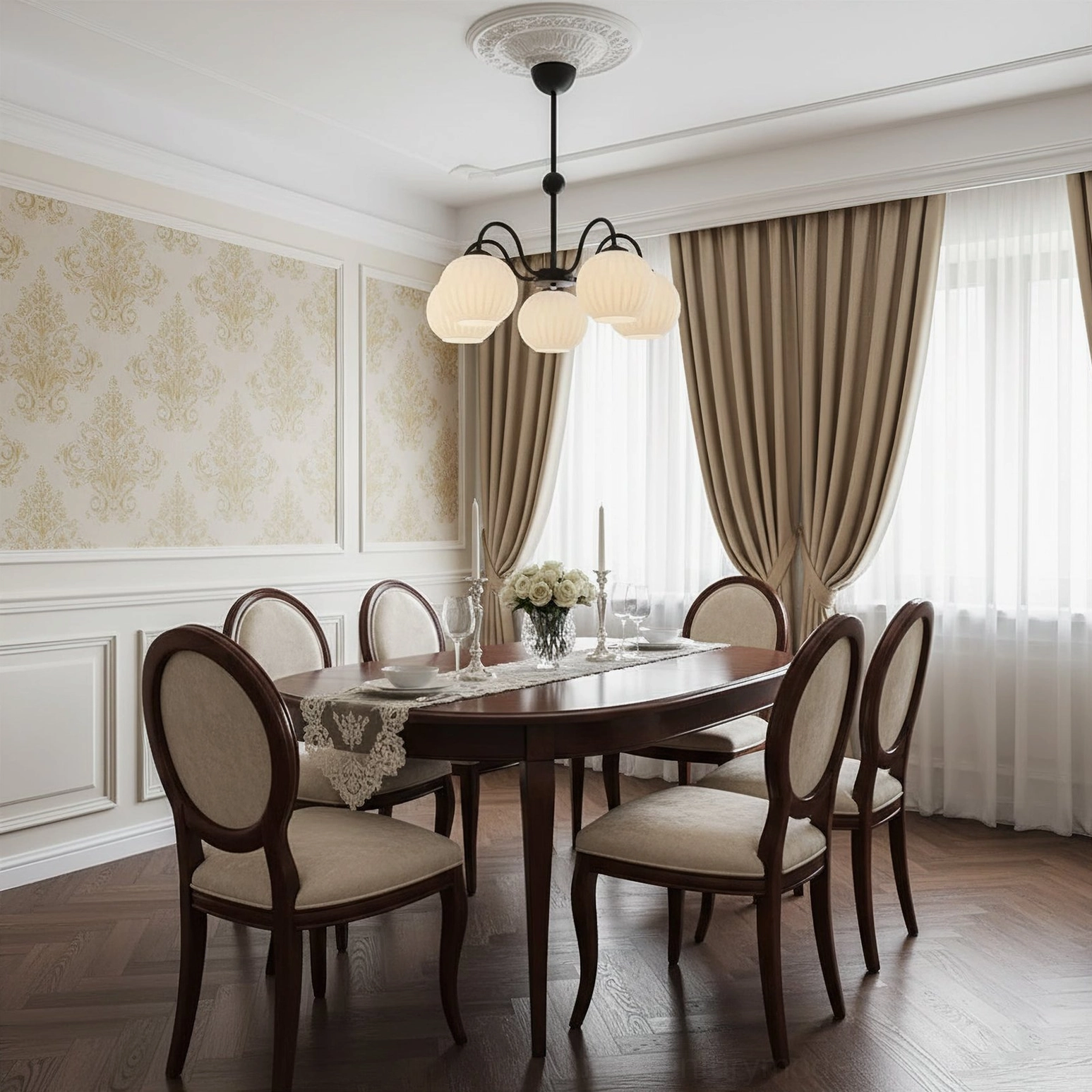 Renee sage green metal frame chandelier in suburban sitting room with paired sofas and coffee table set