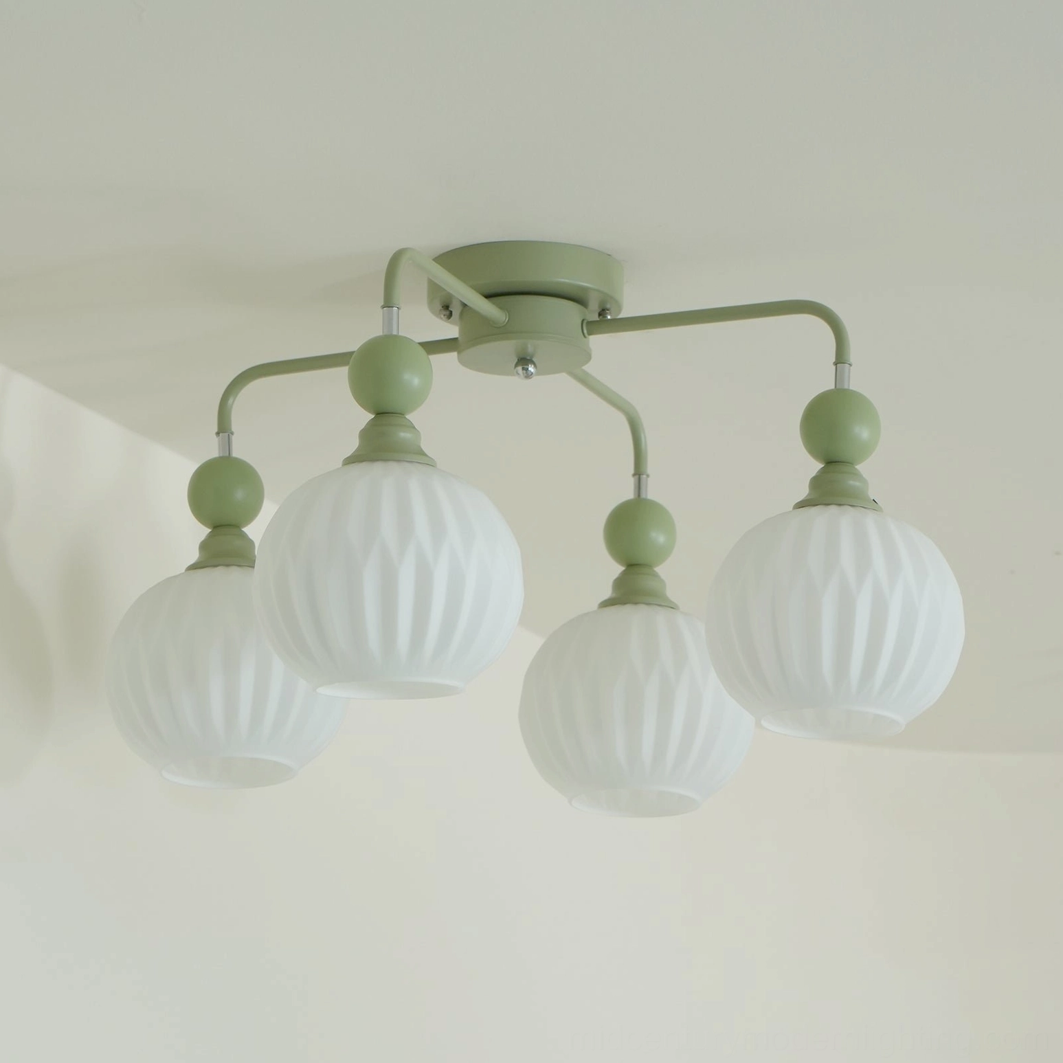 Renee ceiling light showing ribbed glass shade construction and metal frame